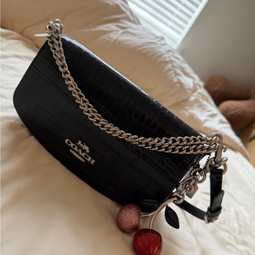 Coach shoulder bag with chain and cherry charm